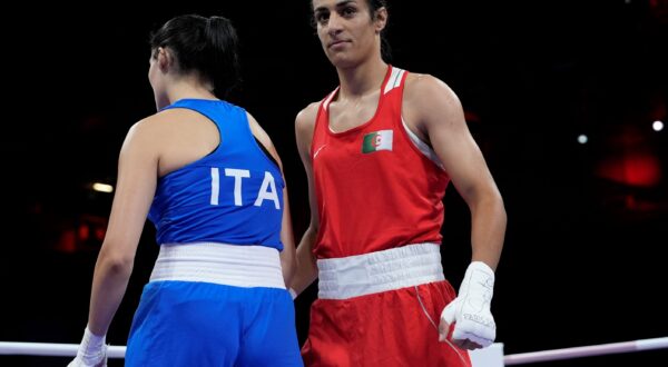 Algeria's Imane Khelif, right, after defeating Italy's Angela Carini, left, in their women's 66kg preliminary boxing match at the 2024 Summer Olympics