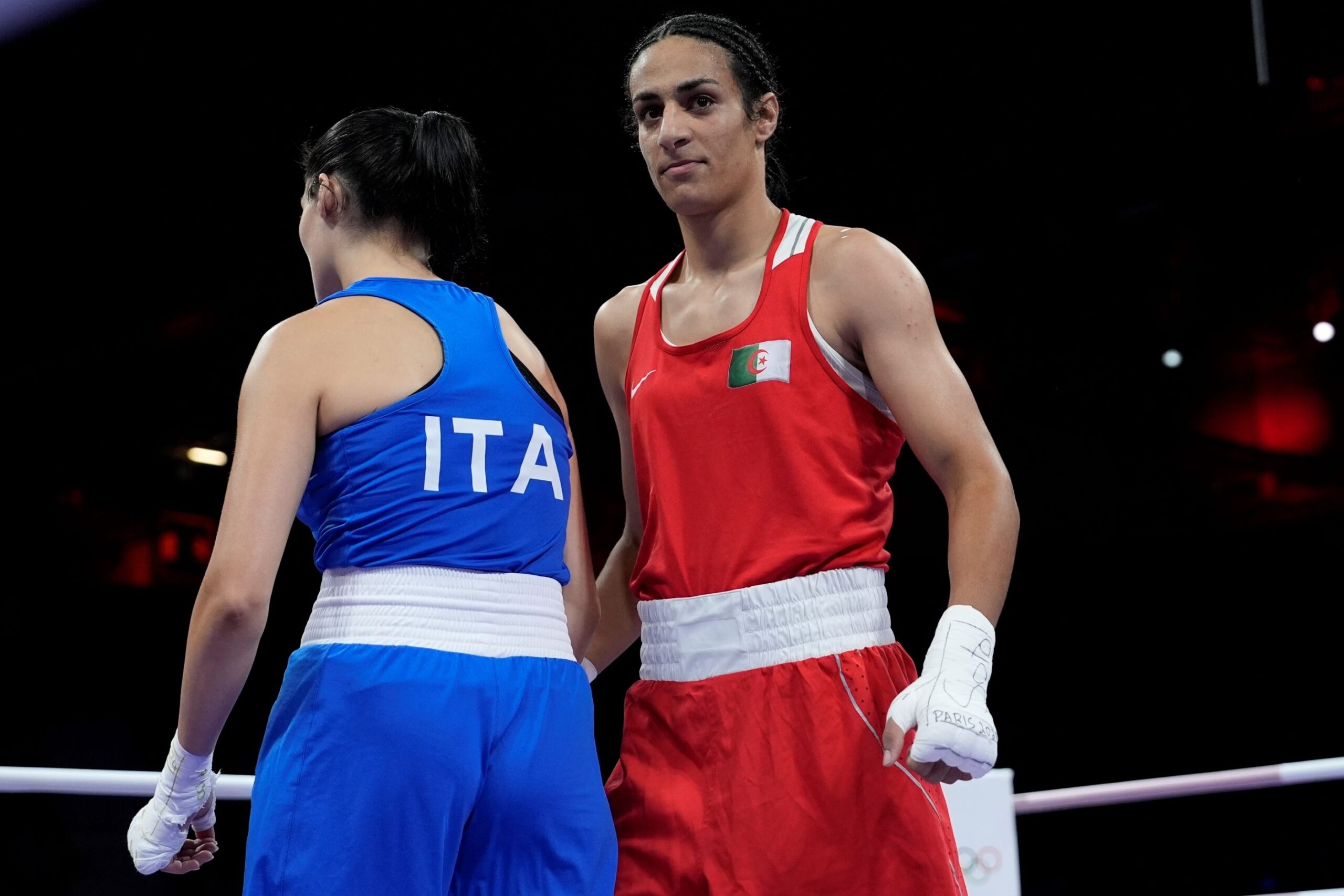 Algeria's Imane Khelif, right, after defeating Italy's Angela Carini, left, in their women's 66kg preliminary boxing match at the 2024 Summer Olympics