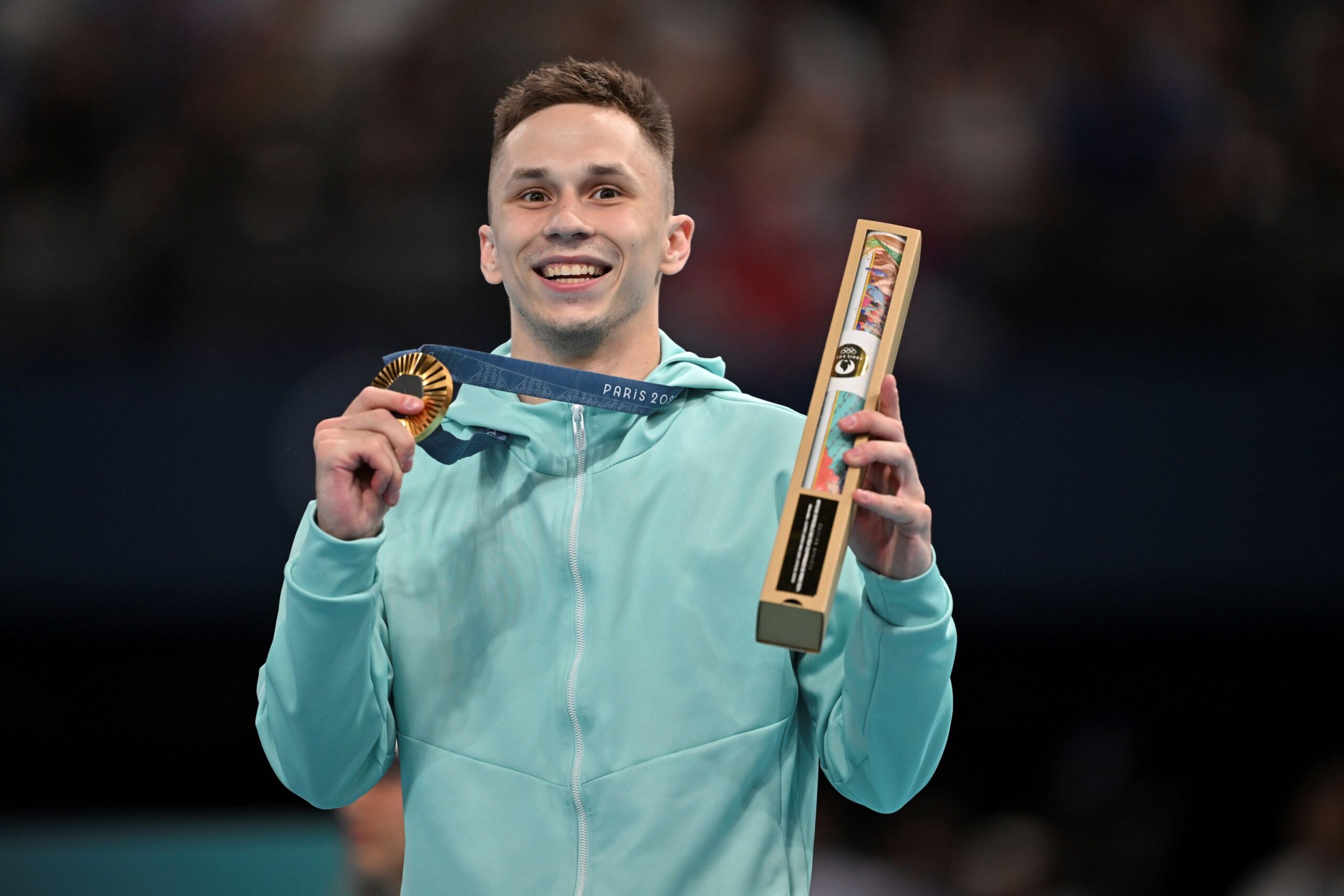 LITVINOVICH Ivan of Individual Neutral Athletes attends a victory ceremony in the Paris Olympics at the Bercy Arena in Paris