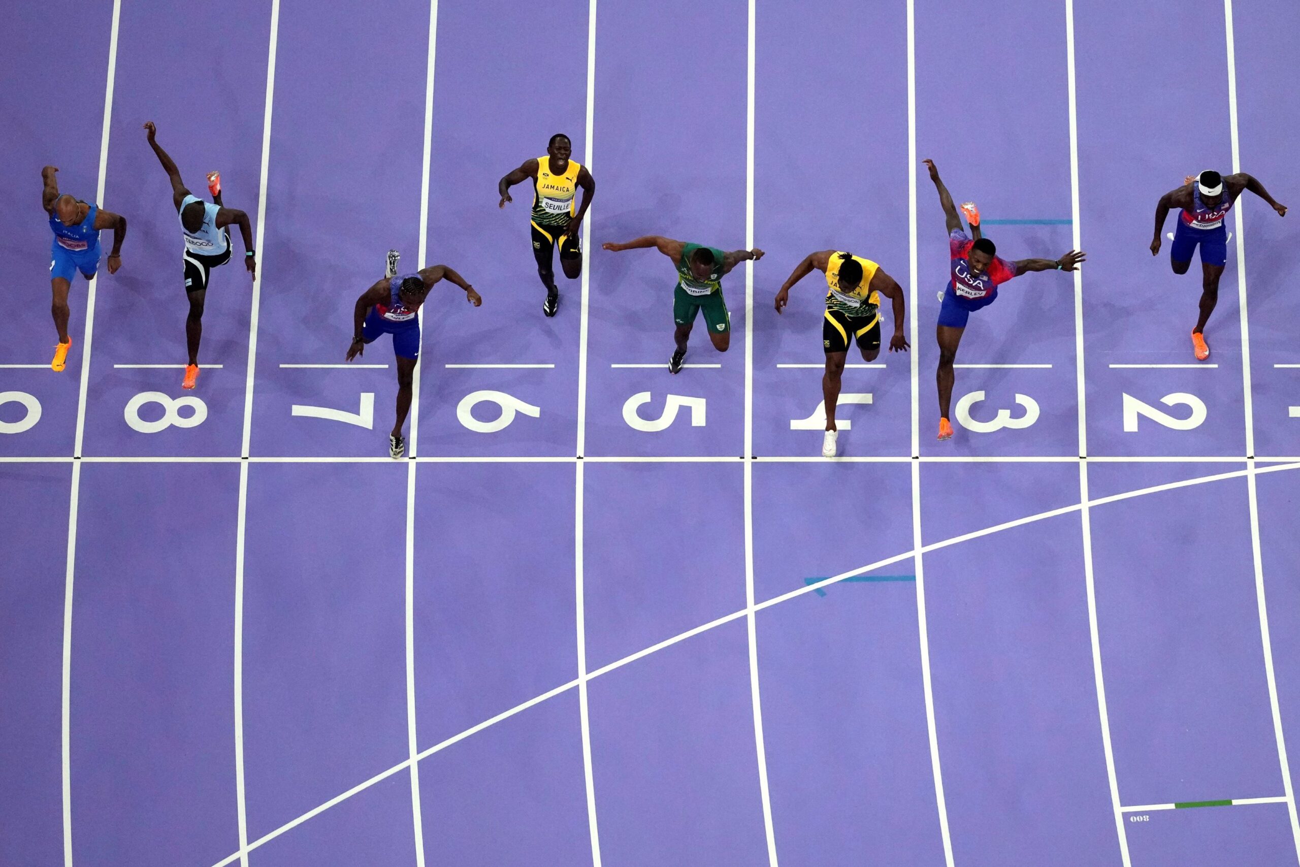 Noah Lyles, of the United States, in lane seven, wins the men's 100-meter final at the 2024 Summer Olympics