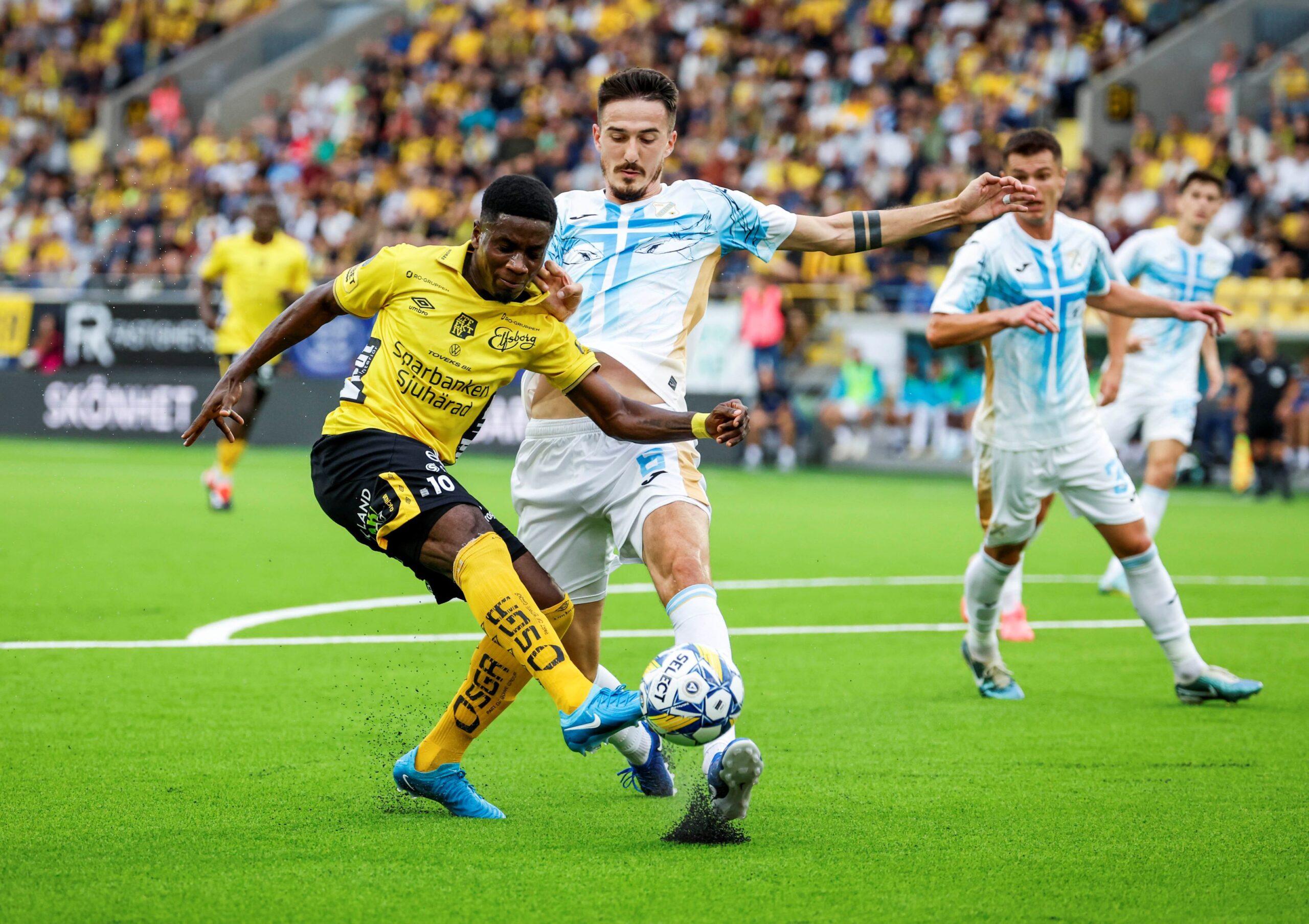 Elfsborg's Michael Baidoo, left and Rijeka's Stjepan Radeljić vie for the ball, during the Europa League third qualifying round, second leg soccer match between Elfsborg and Rijeka, at Boras Arena