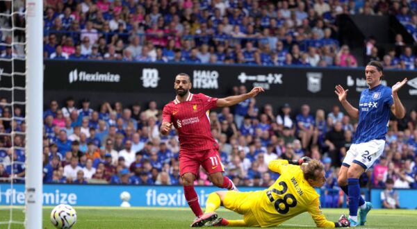 Liverpool's Mohamed Salah scores his side's second goal during the English Premier League soccer match between Ipswich Town and Liverpool at Portman Road stadium in Ipswich