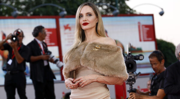 Angelina Jolie poses for photographers upon arrival for the premiere of the film 'Maria' during the 81st edition of the Venice Film Festival in Venice, Italy, on Thursday, Aug. 29, 2024. (Photo by Joel C Ryan/Invision/AP)