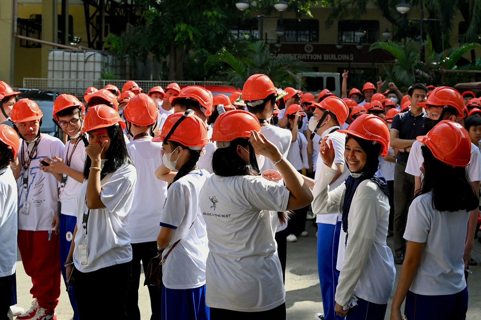 Students gather after evacuating from their school building in Manila on October 13, 2023, after a magnitude 5.2 earthquake struck about 100 kilometres (62 miles) south of the Philippine capital.,Image: 813301096, License: Rights-managed, Restrictions: , Model Release: no, Credit line: JAM STA ROSA / AFP / Profimedia