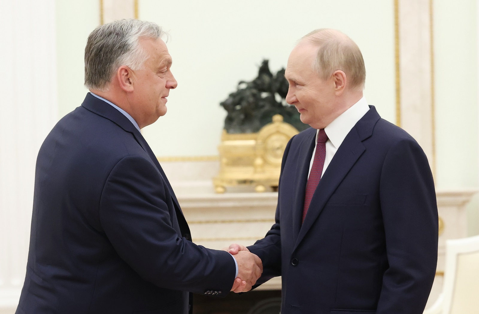 epaselect epa11458762 Russian President Vladimir Putin (R) shakes hands with Hungarian Prime Minister Viktor Orban (L) during a meeting at the Kremlin, in Moscow, Russia, 05 July 2024. Orban arrived in Moscow on a one-day working visit.  EPA/VALERIY SHARIFULIN/SPUTNIK/KREMLIN / POOL MANDATORY CREDIT