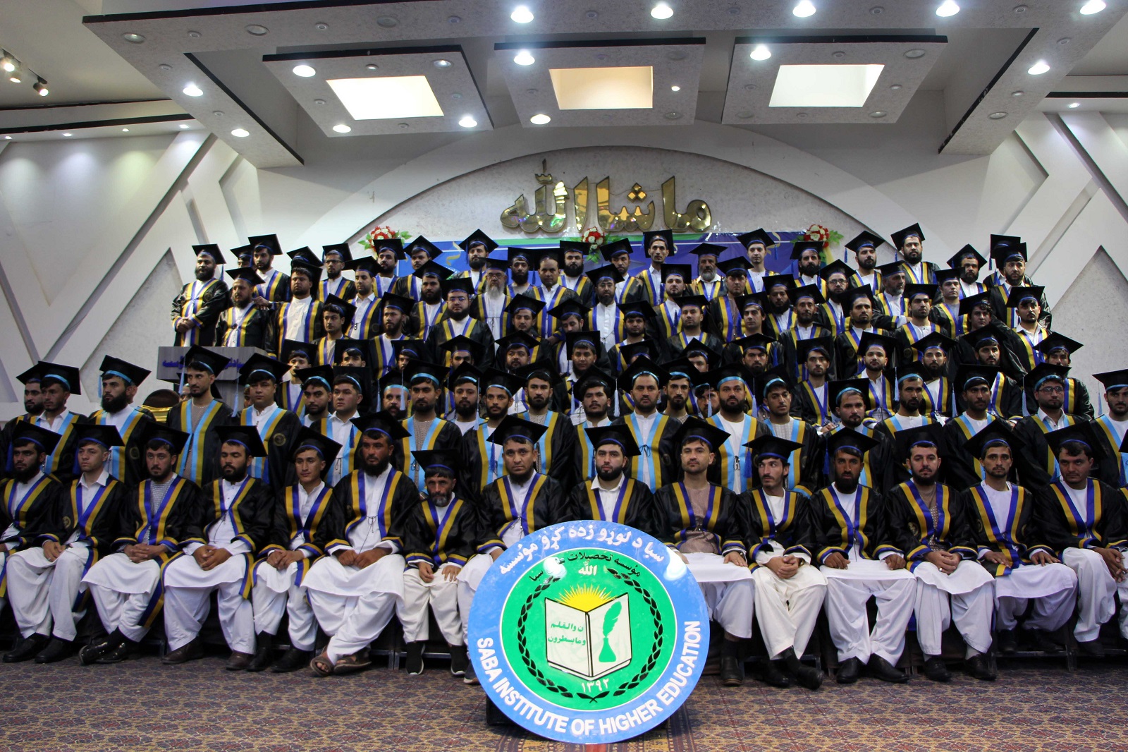 epa11485650 Afghans attend a graduation ceremony at the University in Kandahar, Afghanistan, 18 July 2024. At least 400 students graduated from the faculties of Computer Science and Economics at the Saba Institute of Higher Education.  EPA/SAMIULLAH POPAL