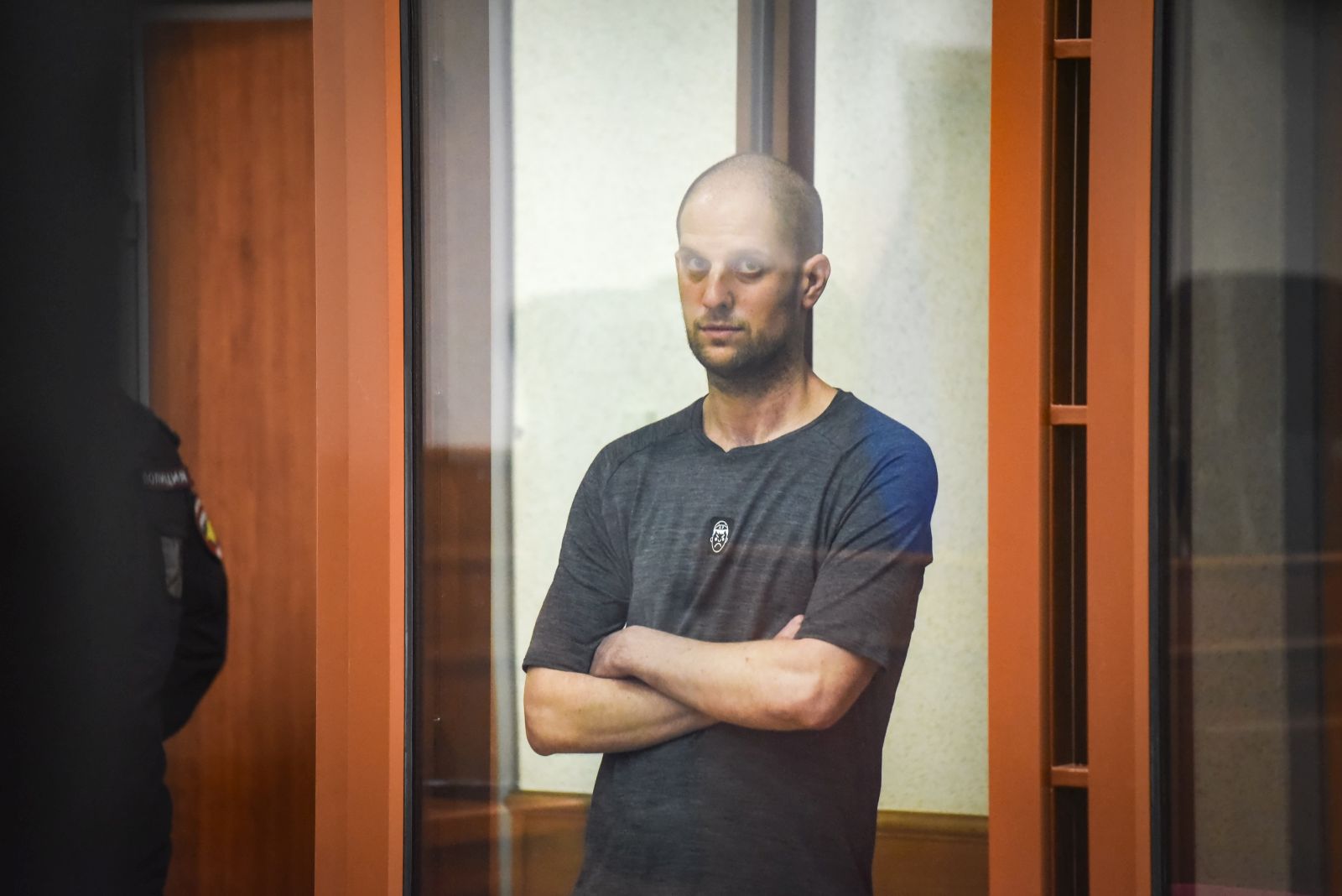 epa11487536 The Wall Street Journal (WSJ) correspondent Evan Gershkovich stands inside a glass defendant's cage during verdict announcement in the case against him, in Yekaterinburg's Sverdlovsk Regional Court, Russia, 19 July 2024. Evan Gershkovich, a US journalist of The Wall Street Journal covering Russia, was detained in Yekaterinburg on 29 March 2023. The Russian Federal Security Service (FSB) claimed that on the instructions of the American authorities, the journalist collected information constituting a state secret about one of the enterprises of the Russian military-industrial complex. Yekaterinburg's Sverdlovsk Regional Court sentenced Evan Gershkovich to 16 years in prison.  EPA/STRINGER