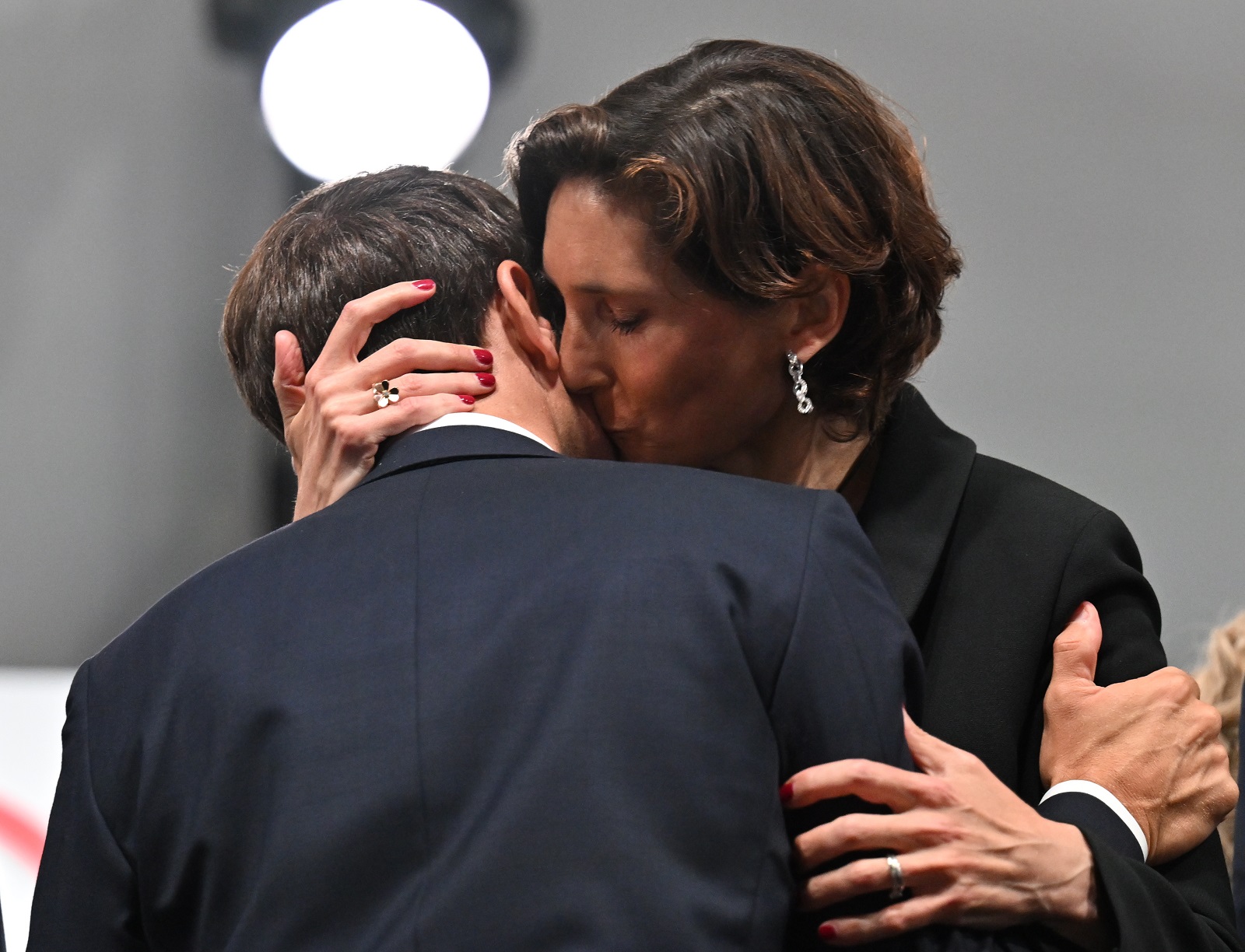 epa11498236 French President Emmanuel Macron (L) and Sports Minister Ameie Oudea-Castera (R) attend the Opening Ceremony of the Paris 2024 Olympic Games, in Paris, France, 26 July 2024.  EPA/Joel Marklund / POOL