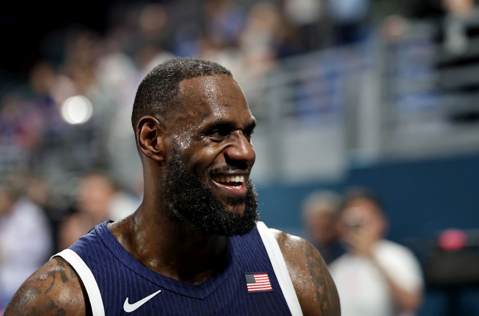 epa11503723 Lebron James of USA reacts after the Men Basketball Group C match between Serbia and USA in the Paris 2024 Olympic Games, at the Pierre Mauroy Stadium in Villeneuve-d'Ascq, France, 28 July 2024.  EPA/ALEX PLAVEVSKI