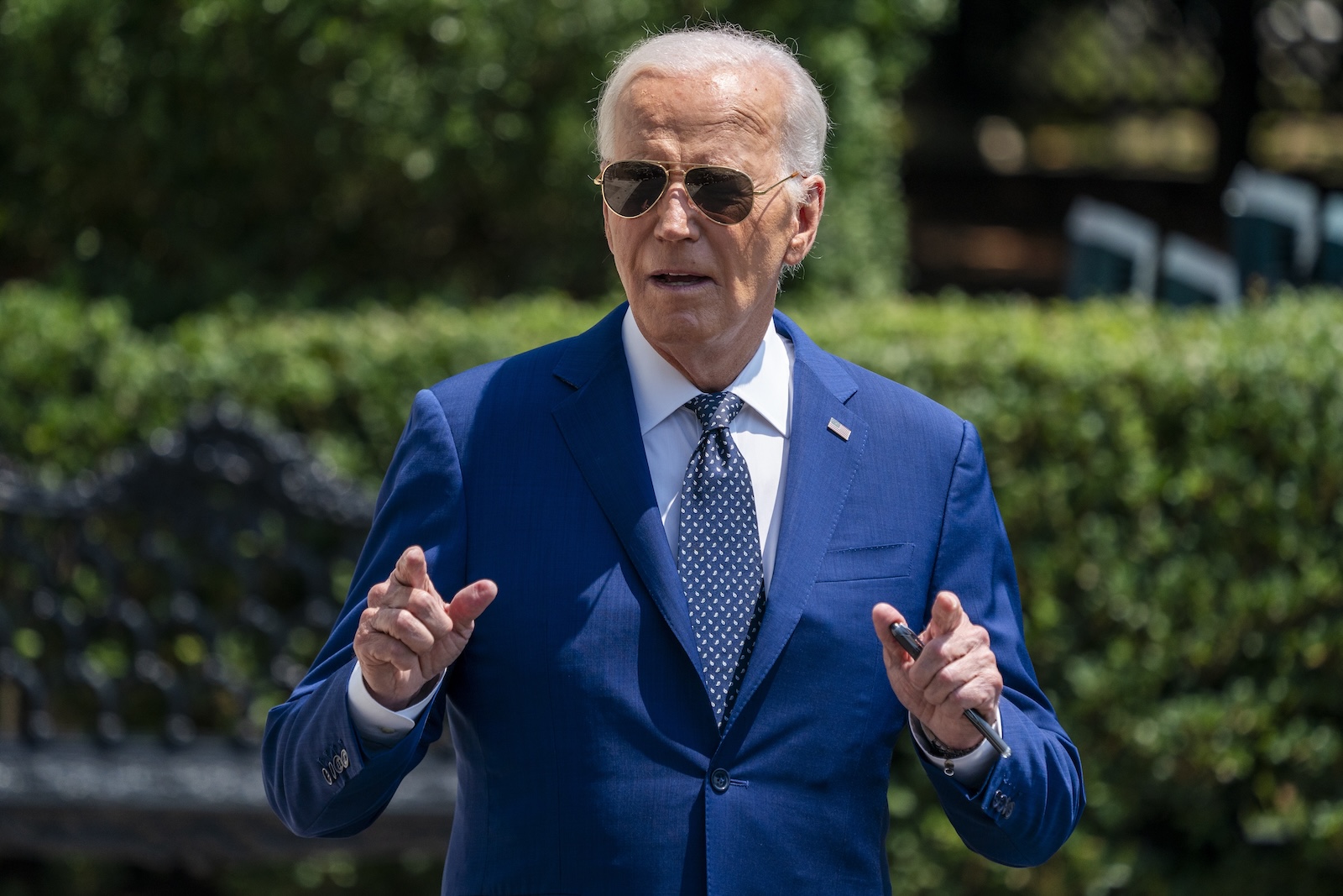 epa11506905 US President Joe Biden speaks to the news media as he walks to board Marine One on the South Lawn of the White House in Washington, DC, USA, 29 July 2024. President Biden will deliver remarks and commemorate the 60th Anniversary of the Civil Rights Act during a visit to the LBJ Presidential Library in Austin, Texas and then pay his respects to the late Congresswoman Sheila Jackson Lee in Huston, Texas.  EPA/SHAWN THEW