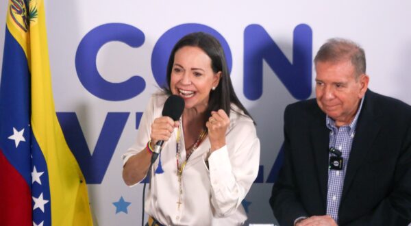 epa11507672 Opposition leader Maria Corina Machado (L) speaks during a press conference with the Presidential candidate to the Venezuelan elections Edmundo Gonzalez Urrutia (R) in Caracas, Venezuela, 29 July 2024. Machado said that the opposition obtained 73 % of the vote tallies, saying they can prove they won the presidential elections that took place on 28 July. The Venezuelan National Electoral Council (CNE) has proclaimed that Nicolas Maduro was re-elected president of Venezuela.  EPA/Manuel Diaz