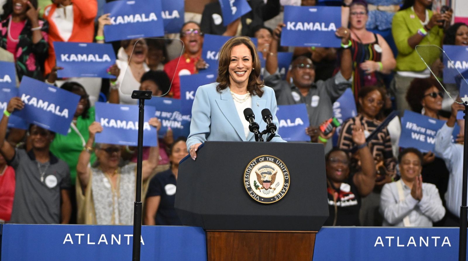 epa11510620 US Vice President Kamala Harris speaks during a campaign rally at Georgia State Convocation Center in Atlanta, Georgia, USA, 30 July 2024.  EPA/EDWARD M. PIO RODA