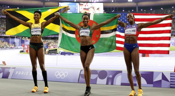 epa11523638 (from L) Second placed Shanieka Ricketts of Jamaica, winner Thea Lafond of Dominica and third placed Jasmine Moore of the usa celebrate after the Women Triple Jump final of the Athletics competitions in the Paris 2024 Olympic Games, at the Stade de France stadium in Saint Denis, France, 03 August 2024.  EPA/FRANCK ROBICHON