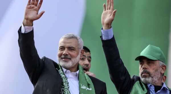 epa11531420 (FILE) Top Hamas leader Sheikh Ismail Haniyeh (L) and leader of Hamas movement in Gaza Strip Yahya Al Sinwar (R) attend a Hamas rally to mark the group's 30th anniversary, in Gaza City, Gaza Strip, 14 December 2017 (reissued 06 August 2024). On 06 August 2024 Hamas announced that Senior Hamas leader in Gaza Strip Yahya Al-Sinwar, became the group's new political leader following the assassination of Hamas leader Ismail Haniyeh in Tehran on 31 July 2024.  EPA/MOHAMMED SABER *** Local Caption *** 53959584