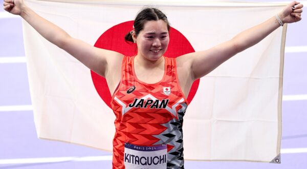 epa11543729 Haruka Kitaguchi of Japan celebrates after winning the Women Javelin Throw Final of the Athletics competitions in the Paris 2024 Olympic Games, at the Stade de France stadium in Saint Denis, France, 10 August 2024.  EPA/ANNA SZILAGYI