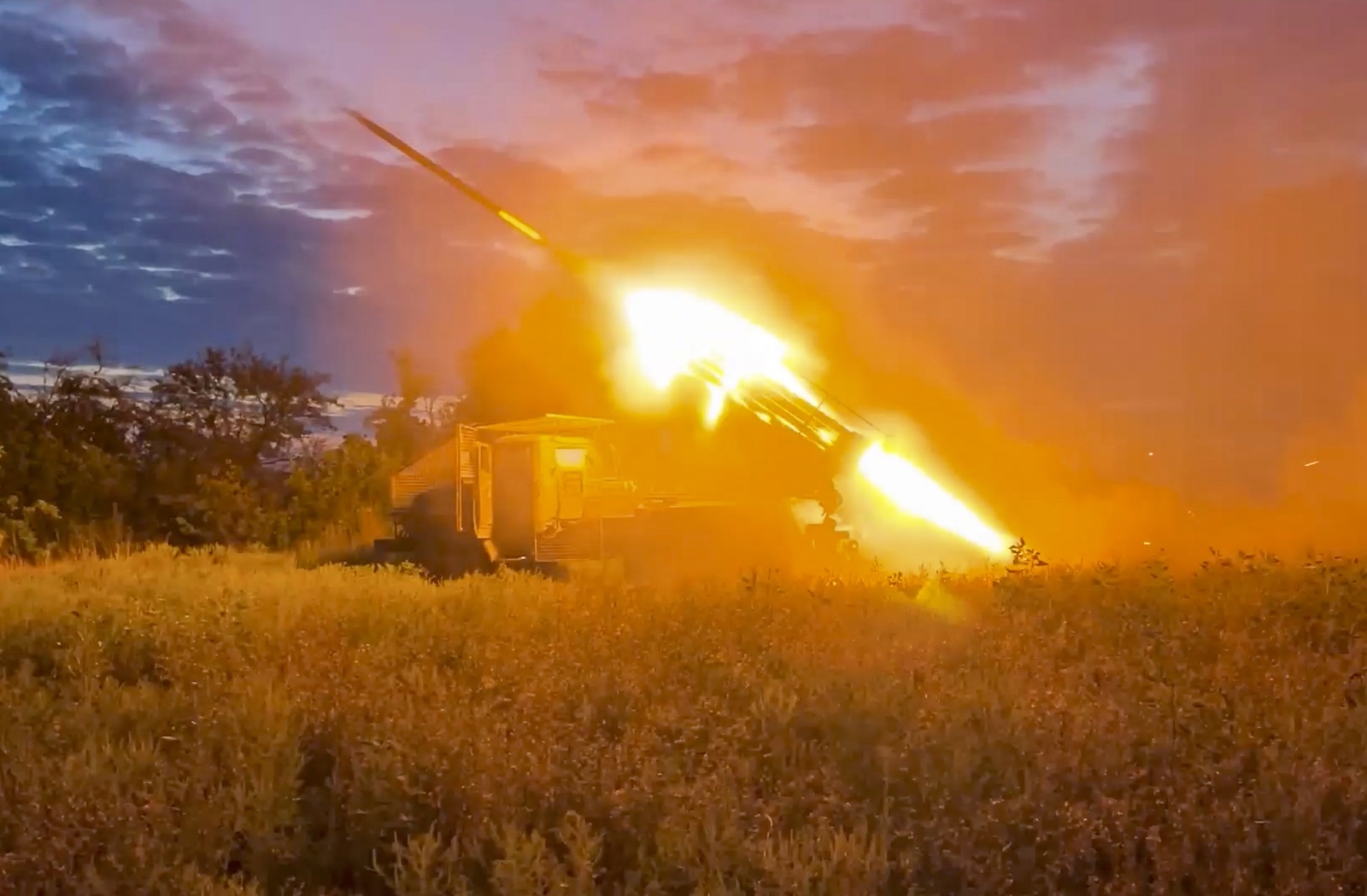 epa11547750 A still image taken from a handout video provided by the Russian Defence Ministry shows the BM-21 â€˜Gradâ€™, a self-propelled 122 mm multiple rocket launcher, firing near the line of combat close to Soledar, Donetsk Region, Ukraine, 13 August 2024.  EPA/RUSSIAN DEFENCE MINISTRY HANDOUT HANDOUT EDITORIAL USE ONLY/NO SALESHANDOUT EDITORIAL USE ONLY/NO SALES