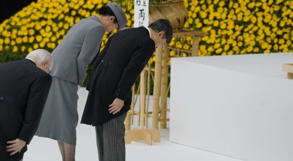 epa11549416 Japanese Emperor Naruhito and Empress Masako bow after giving a condolence speech during the National Memorial Ceremony for the War Dead in Tokyo, Japan, 15 August 2024. Japan marked the 79th anniversary of the end of World War Two, with an estimated more than three million Japanese being killed during its duration.  EPA/KIMIMASA MAYAMA