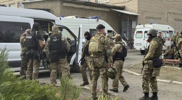 epa11561856 A handout picture made available by the Russian Rosgvardia (National Guard of Russia) Telegram channel shows National Guard of Russia servicemen preparing to storm a prison in Surovkino, Volgograd region, Russia, 23 August 2024. On 23 August, in the IK-19 facility in the city of Surovikino, four prisoners took four prison guards hostage during a meeting of the disciplinary commission. During an operation to free the hostages, snipers from the special forces of the Russian National Guard 'neutralized four prisoners' who had taken the prison employees hostage, freeing the hostages, Rosgvardia stated.  EPA/RUSSIAN ROSGVARDIYA TELEGRAM CHANNEL HANDOUT -- MANDATORY CREDIT -- BEST QUALITY AVAILABLE -- HANDOUT EDITORIAL USE ONLY/NO SALES