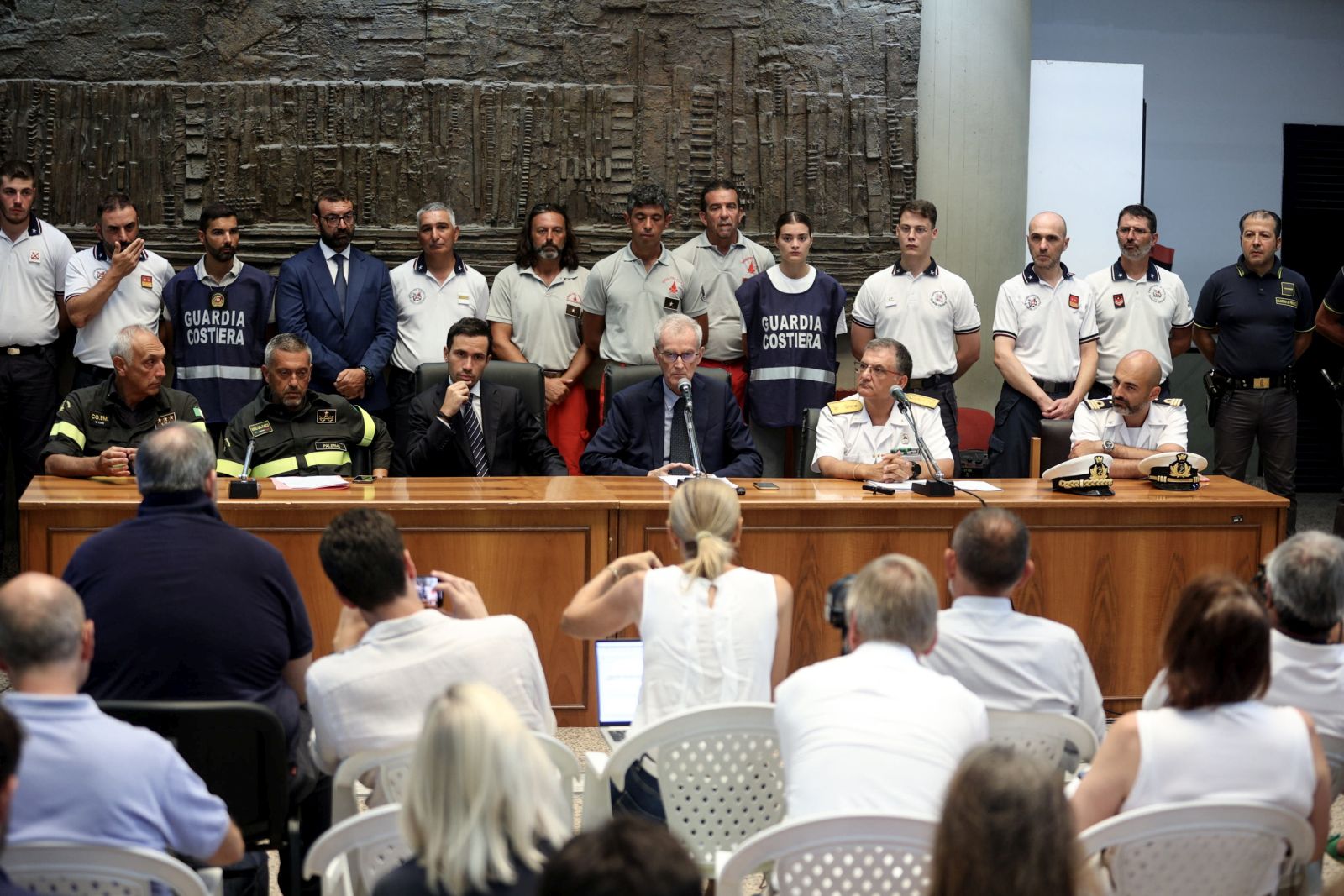 epa11562476 Chief prosecutor of Termini Imerese, Ambrogio Cartosio (C) holds a press conference on the Bayesian shipwreck, in Termini Imerese, near Palermo, Sicily Island, southern Italy, 24 August 2024. The sinking of the Bayesian super-yacht off Sicily on 19 August was a 'sudden and abrupt event', prosecutors investigating the incident for possible negligent-manslaughter charges told a press conference on 24 August. The public prosecutor's office opened a file against 'unknown persons on charges of manslaughter and culpable homicide'.  EPA/IGOR PETYX