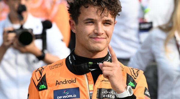 epa11575606 McLaren driver Lando Norris of Britain celebrates after securing pole position in the Qualifying for the Formula One Grand Prix of Italy, in Monza, Italy, 31 August 2024. The 2024 Formula 1 Grand Prix of Italy is held at the Monza National Autodrome circuit race track on 01 September.  EPA/Daniel Dal Zennaro