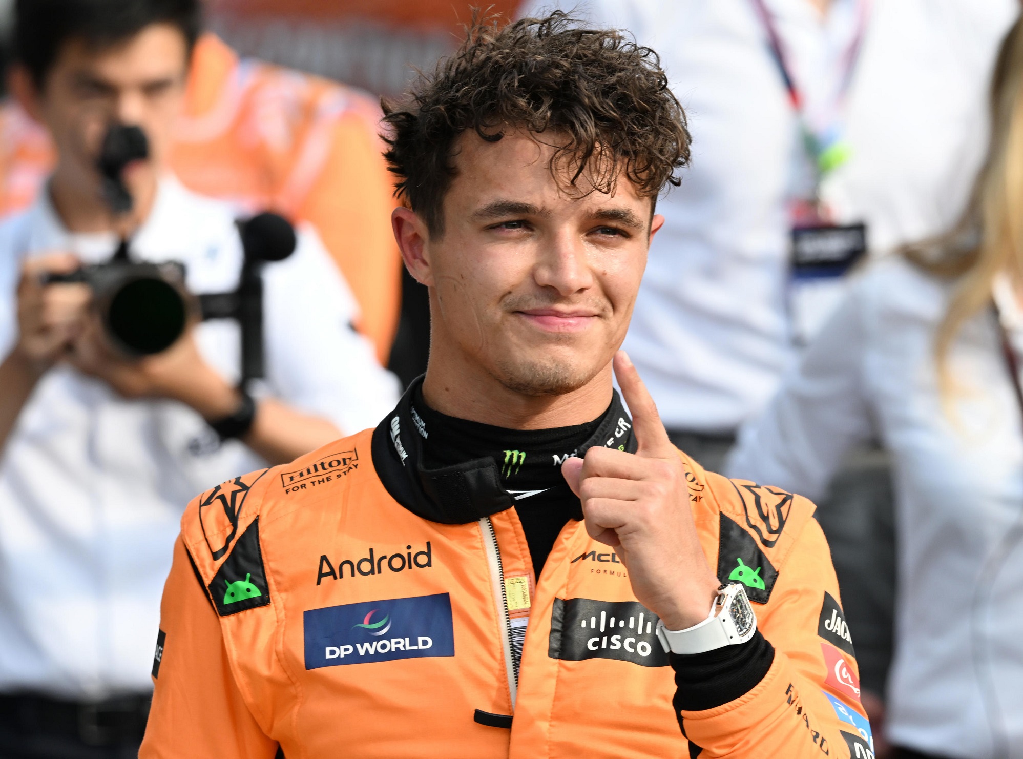 epa11575606 McLaren driver Lando Norris of Britain celebrates after securing pole position in the Qualifying for the Formula One Grand Prix of Italy, in Monza, Italy, 31 August 2024. The 2024 Formula 1 Grand Prix of Italy is held at the Monza National Autodrome circuit race track on 01 September.  EPA/Daniel Dal Zennaro