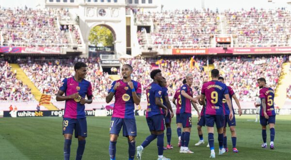 epa11575681 FC Barcelona's Raphinha (2L) celebrates after scoring during a Spanish LaLiga EA Sports soccer match between FC Barcelona and Real Valladolid at Lluis Companys Olympic stadium in Barcelona, Spain, 31 August 2024.  EPA/Alejandro Garcia