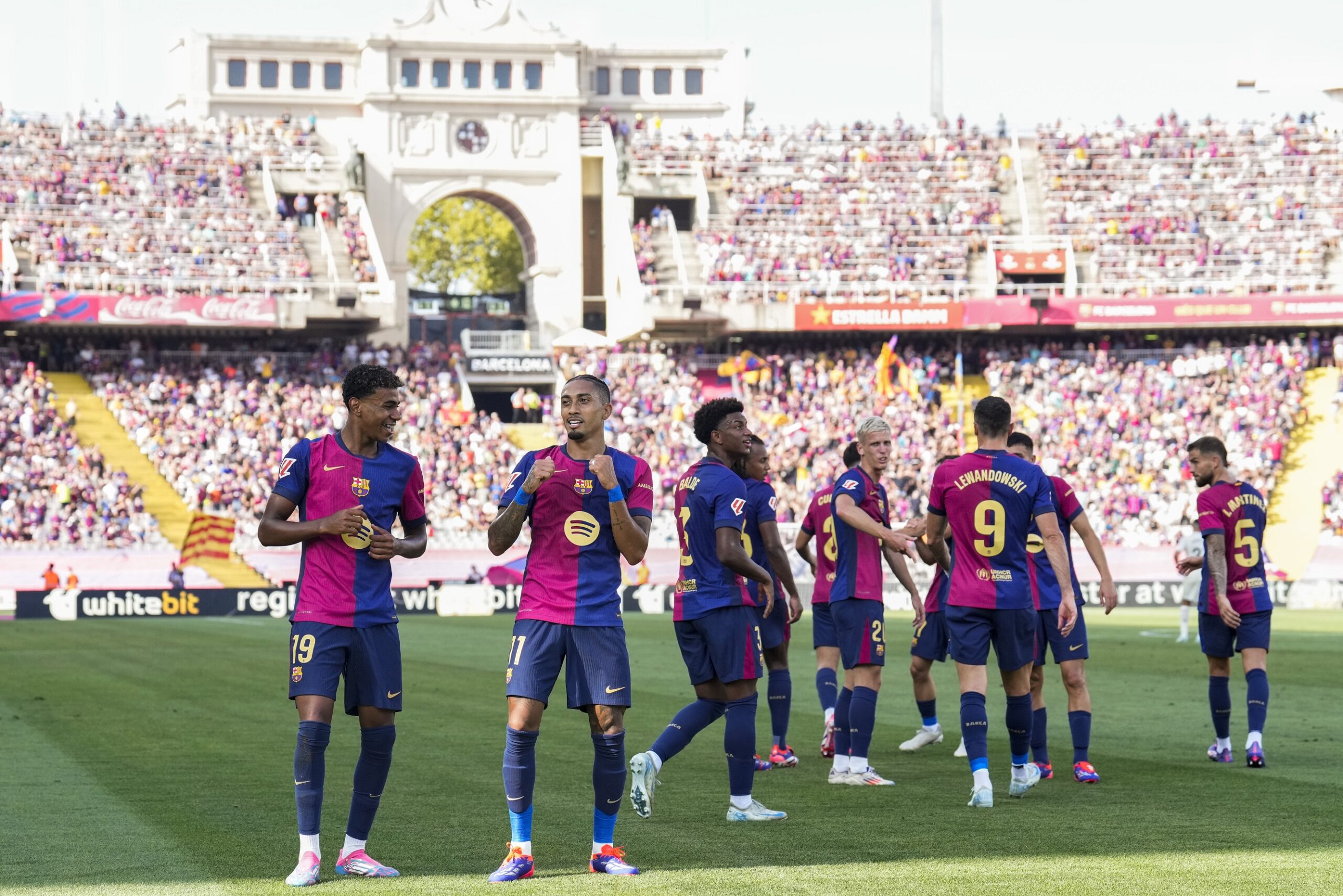 epa11575681 FC Barcelona's Raphinha (2L) celebrates after scoring during a Spanish LaLiga EA Sports soccer match between FC Barcelona and Real Valladolid at Lluis Companys Olympic stadium in Barcelona, Spain, 31 August 2024.  EPA/Alejandro Garcia