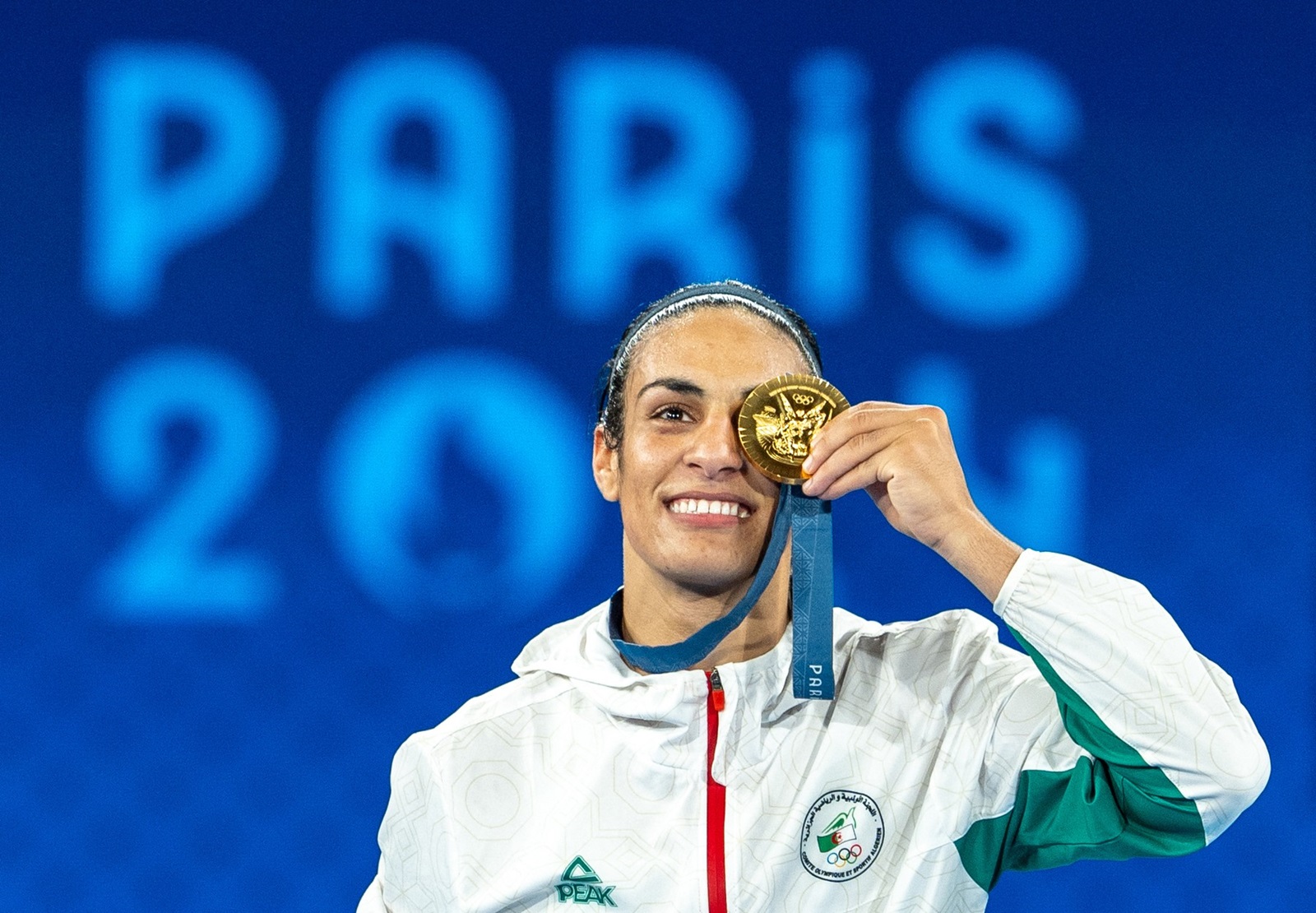 PARIS, FRANCE - AUGUST 09: Imane Khelif of Team Algeria celebrates as she wins gold medal after defeating Liu Yang (blue) of China in the Boxing Women's 66kg Final match on day fourteen of the Olympic Games Paris 2024 at Roland Garros on August 09, 2024 in Paris, France. Aytac Unal / Anadolu/ABACAPRESS.COM,Image: 897490219, License: Rights-managed, Restrictions: , Model Release: no, Credit line: AA/ABACA / Abaca Press / Profimedia