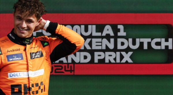 Winner McLaren's British driver Lando Norris celebrates during the podium ceremony after the Formula One Dutch Grand Prix at The Circuit Zandvoort, western Netherlands, on August 25, 2024.,Image: 901454031, License: Rights-managed, Restrictions: , Model Release: no, Credit line: SIMON WOHLFAHRT / AFP / Profimedia