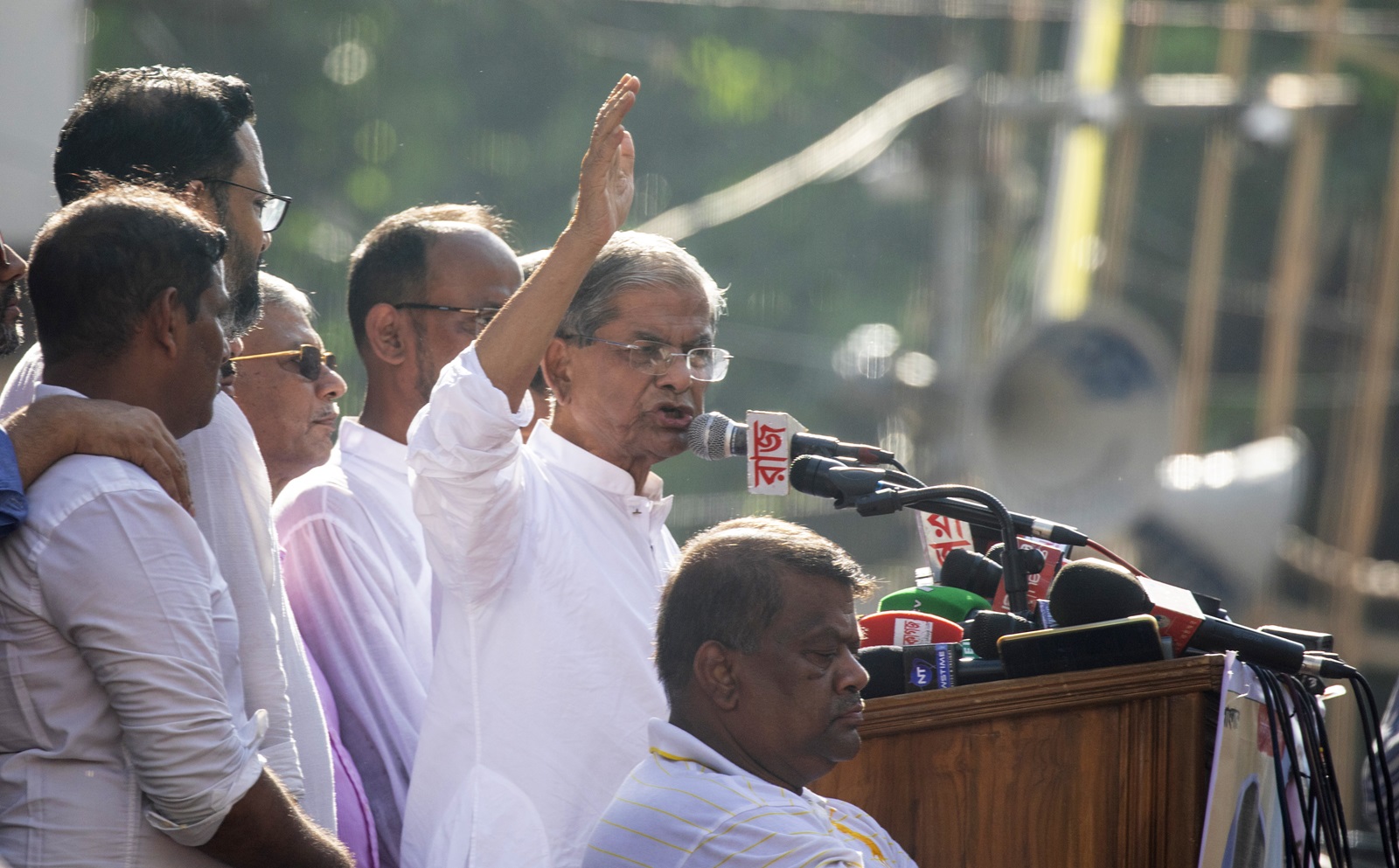 epa11533585 Bangladesh Nationalist Party (BNP) Sectary General Mirza Fakhrul Islam Alamgir (C) speaks to supporters during a mass party rally at the Naya Paltan area, in Dhaka, Bangladesh, 07 August 2024. Thousands of supporters gathered around the office of the Bangladesh Nationalist Party (BNP) in the Naya Paltan area for a mass rally, with the acting chairman Tarique Rahman expected to address virtually. In an address to the nation, Chief of Army Staff General Waker-Uz-Zaman announced on 05 August that Prime Minister Sheikh Hasina has resigned after weeks of unrest and an interim government will be formed to run the country. Bangladeshi President's press secretary announced on 07 August that Muhammad Yunus was chosen to be Bangladesh's interim leader after the resignation of former prime minister Sheikh Hasina.  EPA/MONIRUL ALAM