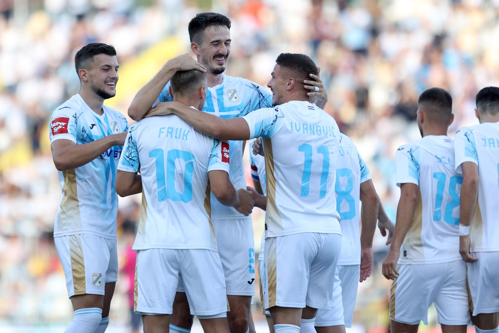 04.08.2024., stadion HNK Rijeka, Rijeka - SuperSport HNL, 01. kolo, HNK Rijeka - NK Lokomotiva. Slavlje nogometasa Rijeke nakon pogotka Tonija Fruka za vodstvo 1:0. Toni Fruk, Stjepan Radeljic, Franjo Ivanovic Photo: Nel Pavletic/PIXSELL