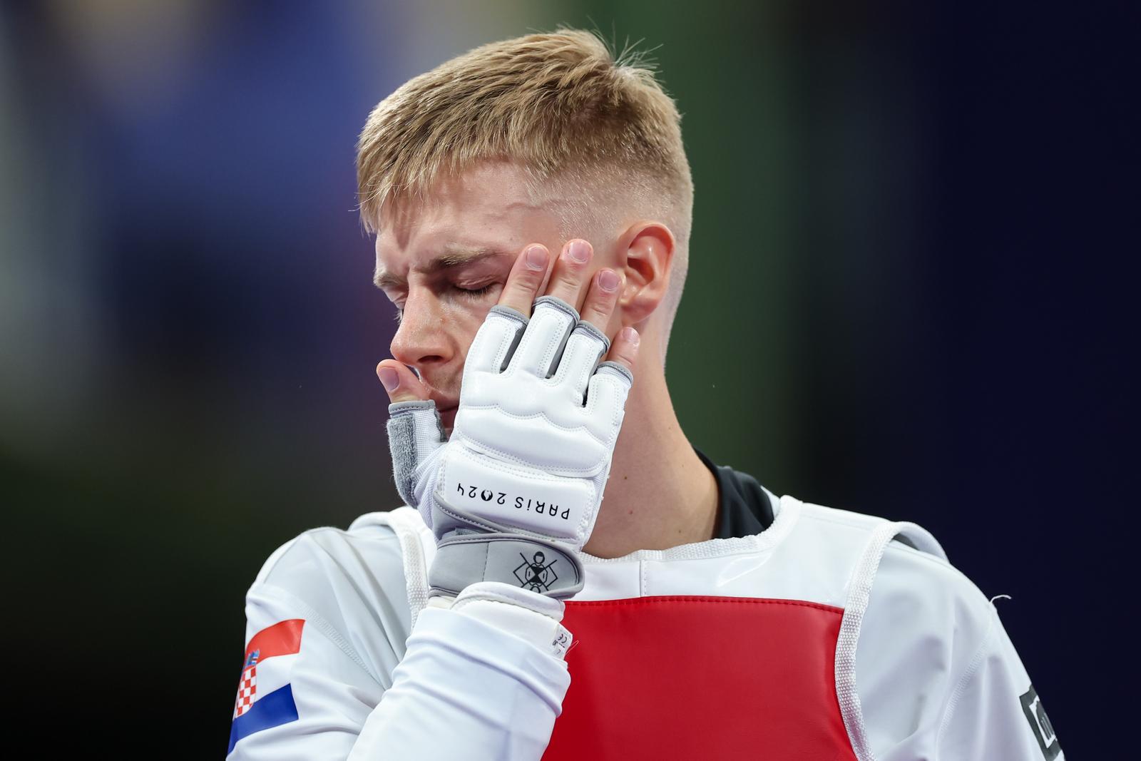 08.08.2024., Pariz, Francuska - XXXIII. Olimpijske igre Pariz 2024. Taekwondo, cetvrtfinale, muskarci do 68kg, Bradly Sinden, Velika Britanija - Marko Golubic, Hrvatska. Photo: Igor Kralj/PIXSELL