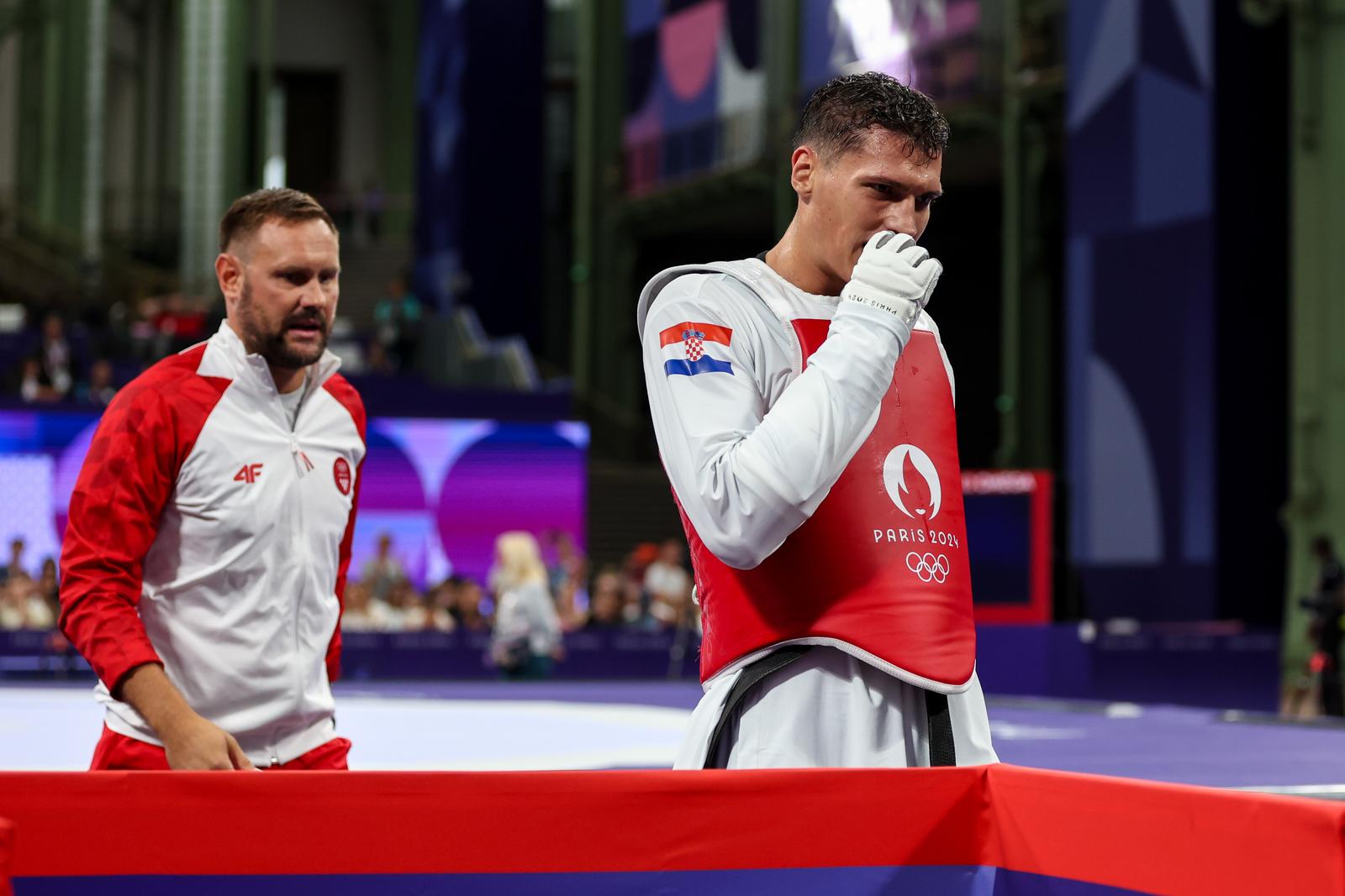 10.08.2024., Pariz, Francuska - XXXIII. Olimpijske igre Pariz 2024. Taekwondo, polufinale, muskarci preko 80kg, Arian Salimi, Iran - Ivan Sapina, Hrvatska. Photo: Igor Kralj/PIXSELL