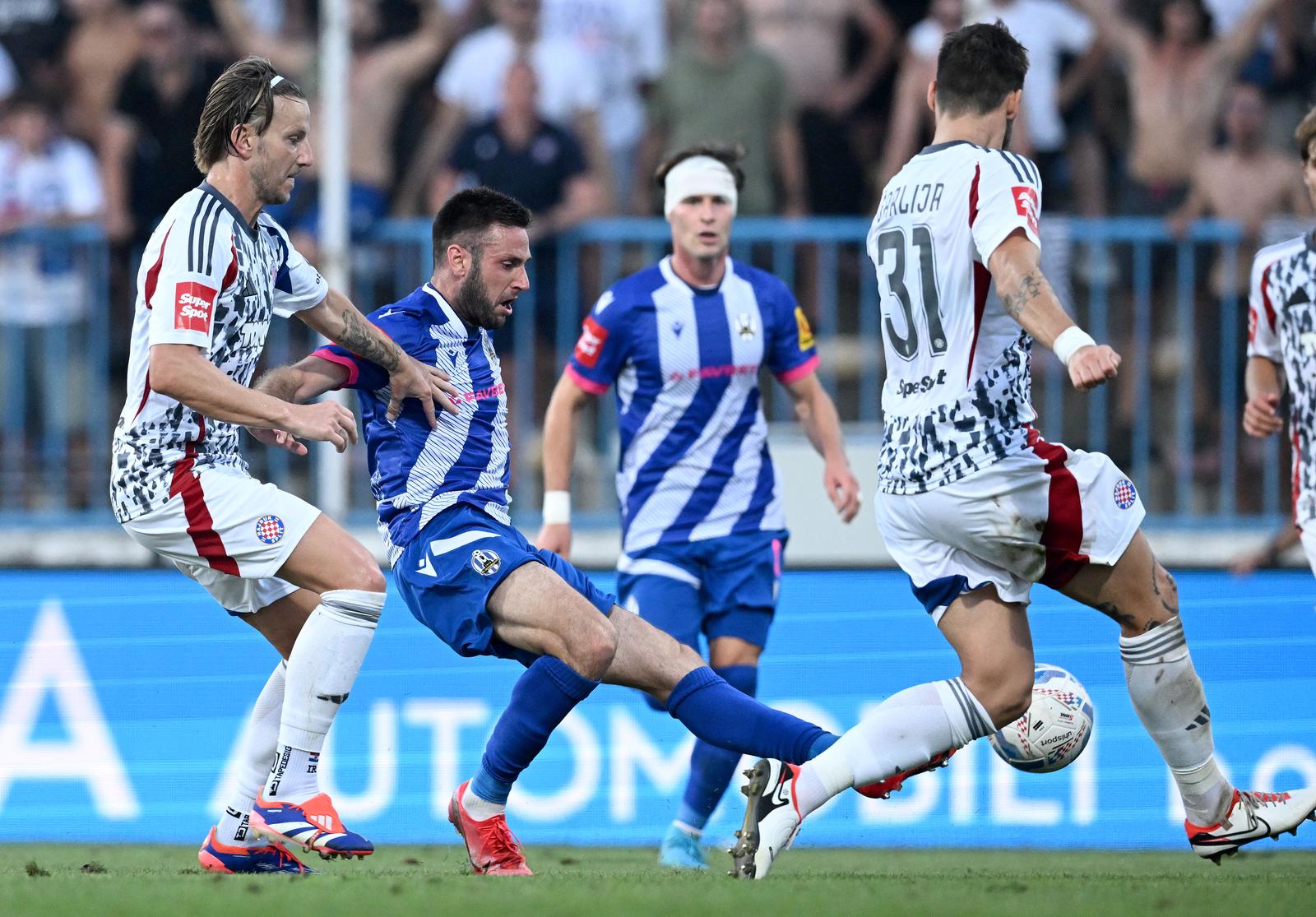 11.08.2024., stadion Zagreb, Zagreb - SuperSport HNL, 02. kolo, NK Lokomotiva - HNK Hajduk. Ivan Rakitic, Duje Cop Photo: Marko Lukunic/PIXSELL