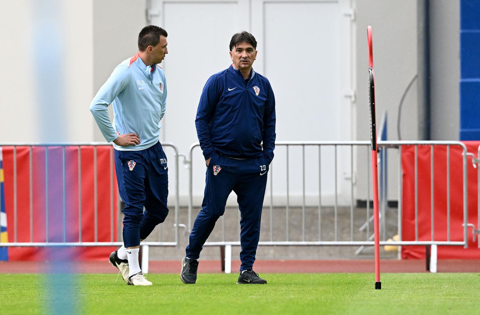 12.06.2024., Neuruppin, Njemacka -  Trening hrvatske nogometne reprezentacije. Zlatko Dalic, Mario Mandzukic Photo: Marko Lukunic/PIXSELL