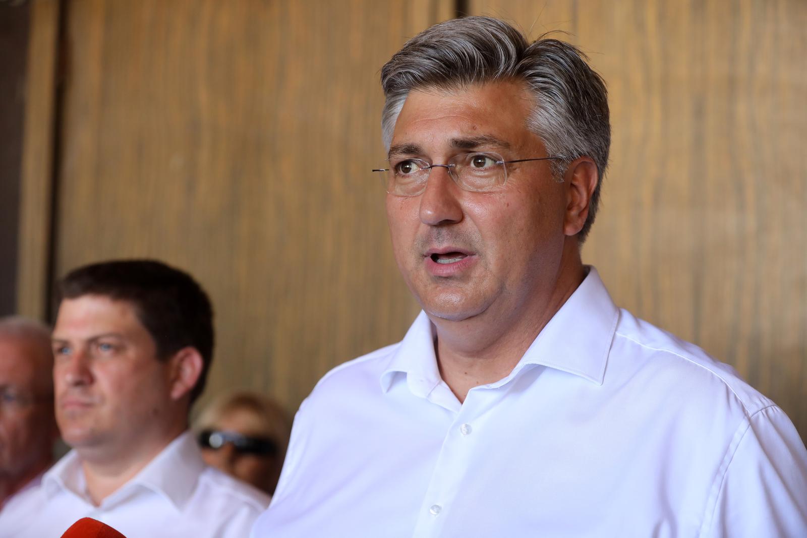 15.08.2024., Rijeka - Predsjednik Vlade Republike Hrvatske Andrej Plenkovic, ministar Oleg Butkovic i predsjednik uprave Jadrolinije David Sopta na misi u preivoju Svetista majke Bozje Trsatske na blagdan Velike Gospe. Photo: Goran Kovacic/PIXSELL