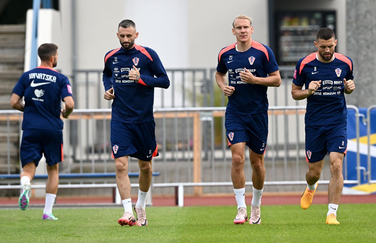 21.06.2024., Neuruppin, Njemacka - Europsko prvenstvo 2024. Trening hrvatske nogometne reprezentacije na trening-igralistu Volksparkstadion. Marcelo Brozovic, Domagoj Vida, Mateo Kovacic Photo: Marko Lukunic/PIXSELL