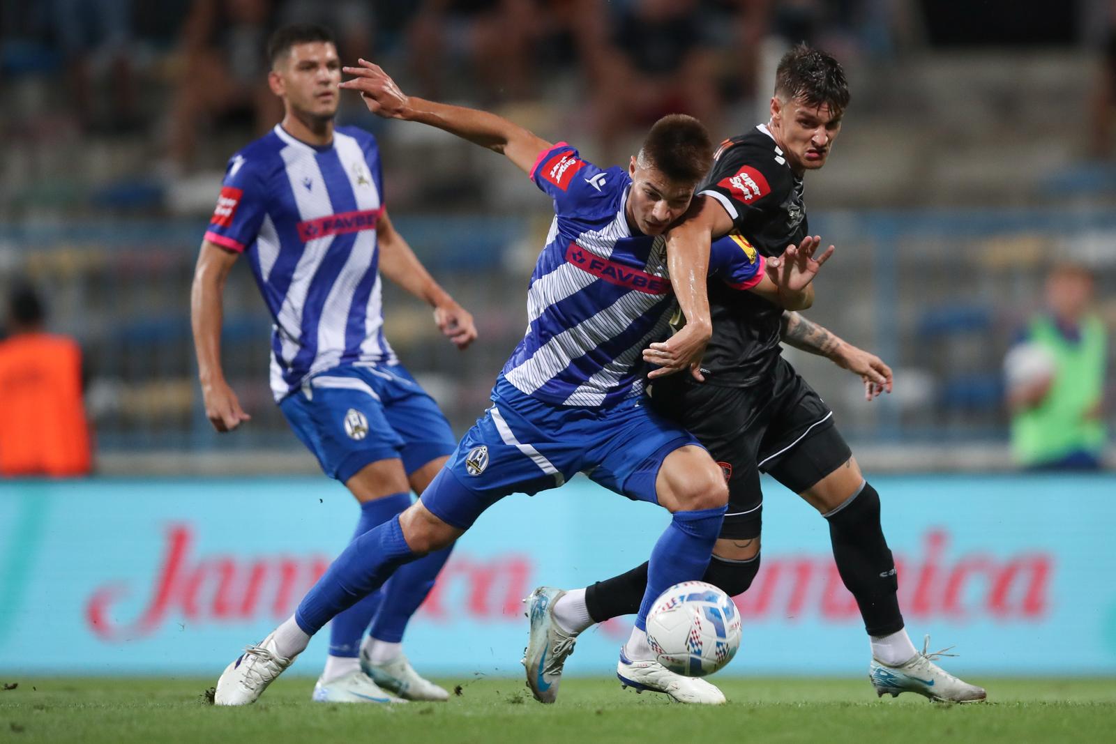 23.08.2024., stadion u Kranjcevicevoj ulici, Zagreb - SuperSport HNL, 04. kolo, NK Lokomotiva - HNK Sibenik. Moreno Zivkovic, Ivan Bozic Photo: Slavko Midzor/PIXSELL