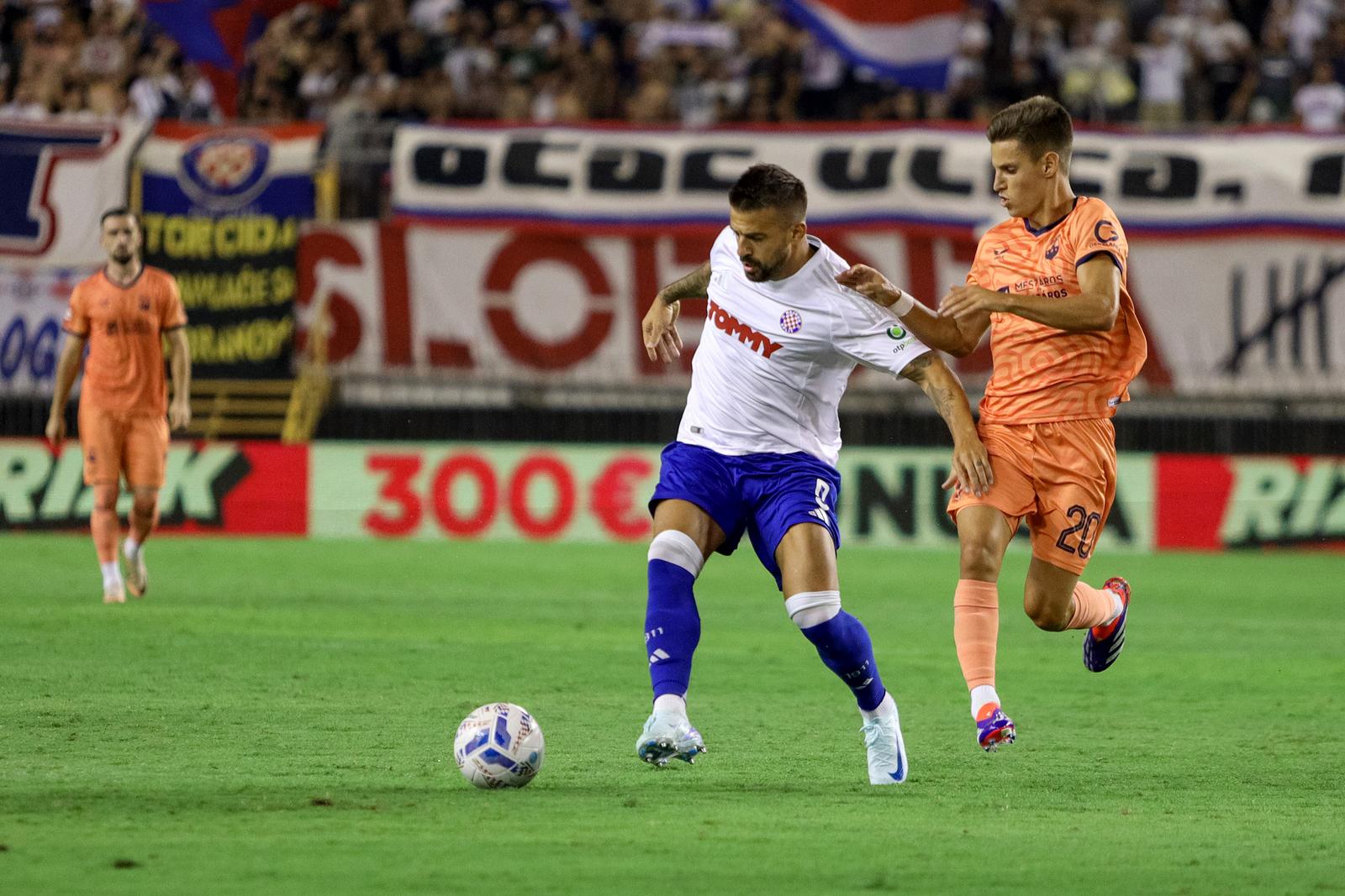 31.08.2024., stadion Poljud, Split - SuperSport HNL, 05. kolo, HNK Hajduk - NK Osijek. Aleksandar Trajkovski, Tiago Dantas Photo: Sime Zelic/PIXSELL