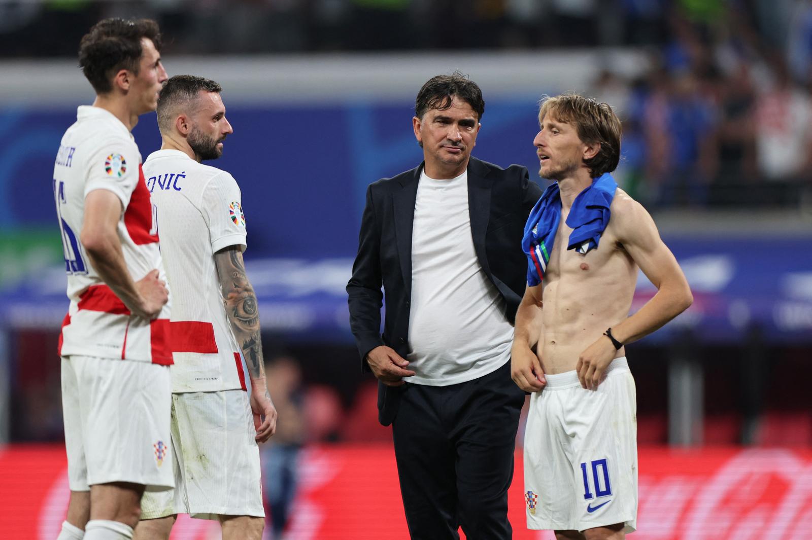 Soccer Football - Euro 2024 - Group B - Croatia v Italy - Leipzig Stadium, Leipzig, Germany - June 24, 2024  Croatia coach Zlatko Dalic, Luka Modric, Marcelo Brozovic and Ante Budimir look dejected after the match REUTERS/Karina Hessland Photo: Karina Hessland/REUTERS