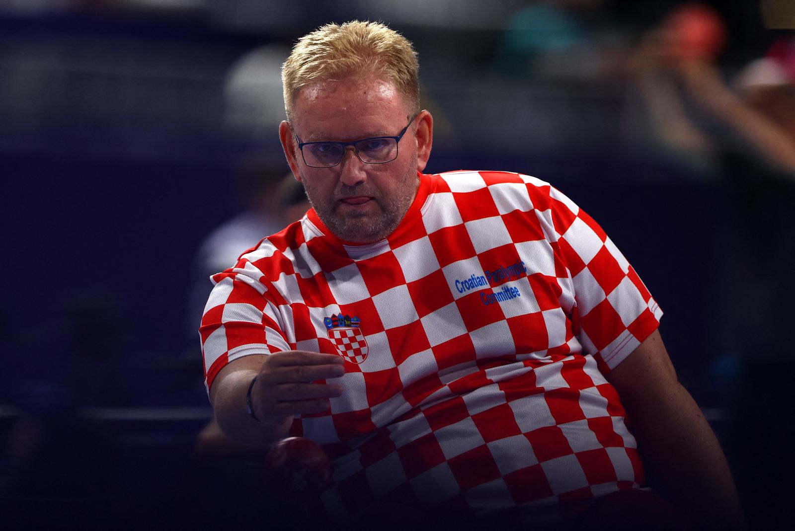 Paris 2024 Paralympics - Boccia -  Men's Individual - BC4 Preliminary Round - Pool B - South Paris Arena 1, Paris, France - August 29, 2024 Davor Komar of Croatia in action during his match against Martin Streharsky of Slovakia REUTERS/Jeremy Lee Photo: JEREMY LEE/REUTERS