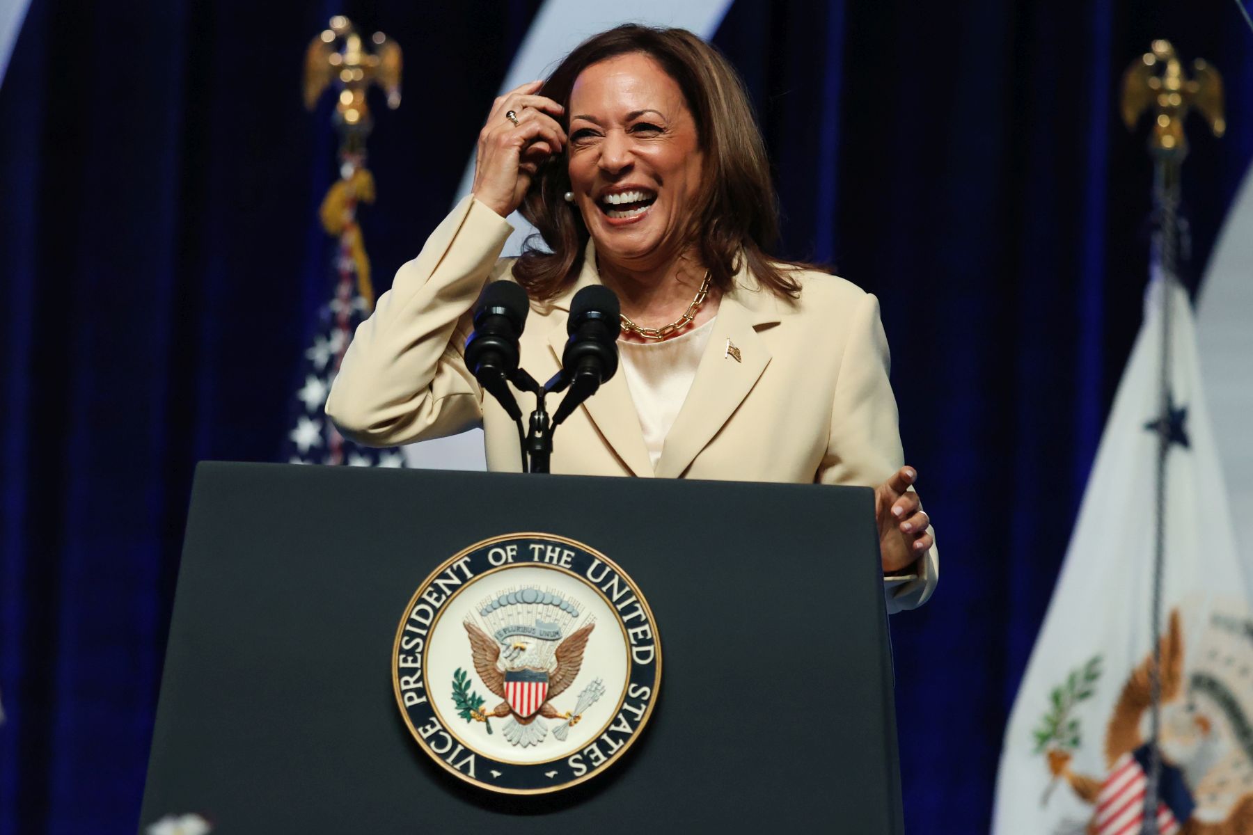 epa11494553 US Vice President Kamala Harris speaks during the Boule Social Justice Town Hall and Luncheon at the Zeta Phi Beta 2024 Grand Boule in Indianapolis, Indiana, USA, 24 July 2024. President Biden announced on 21 July that he would no longer seek re-election and endorsed Vice President Harris to be the Democratic presidential nominee for the US elections in November 2024.  EPA/BRIAN SPURLOCK