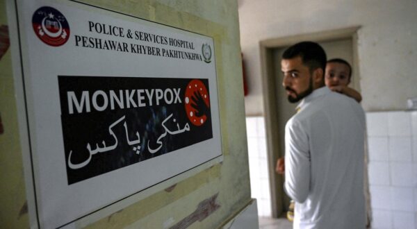 A poster indicating an isolation ward, prepared for mpox patients, is seen at the Police and Services hospital in Peshawar on August 20, 2024. A case of mpox in Pakistan announced last week was not the new strain spreading through Africa, health officials said on August 19.,Image: 900061144, License: Rights-managed, Restrictions: , Model Release: no, Credit line: Abdul MAJEED / AFP / Profimedia