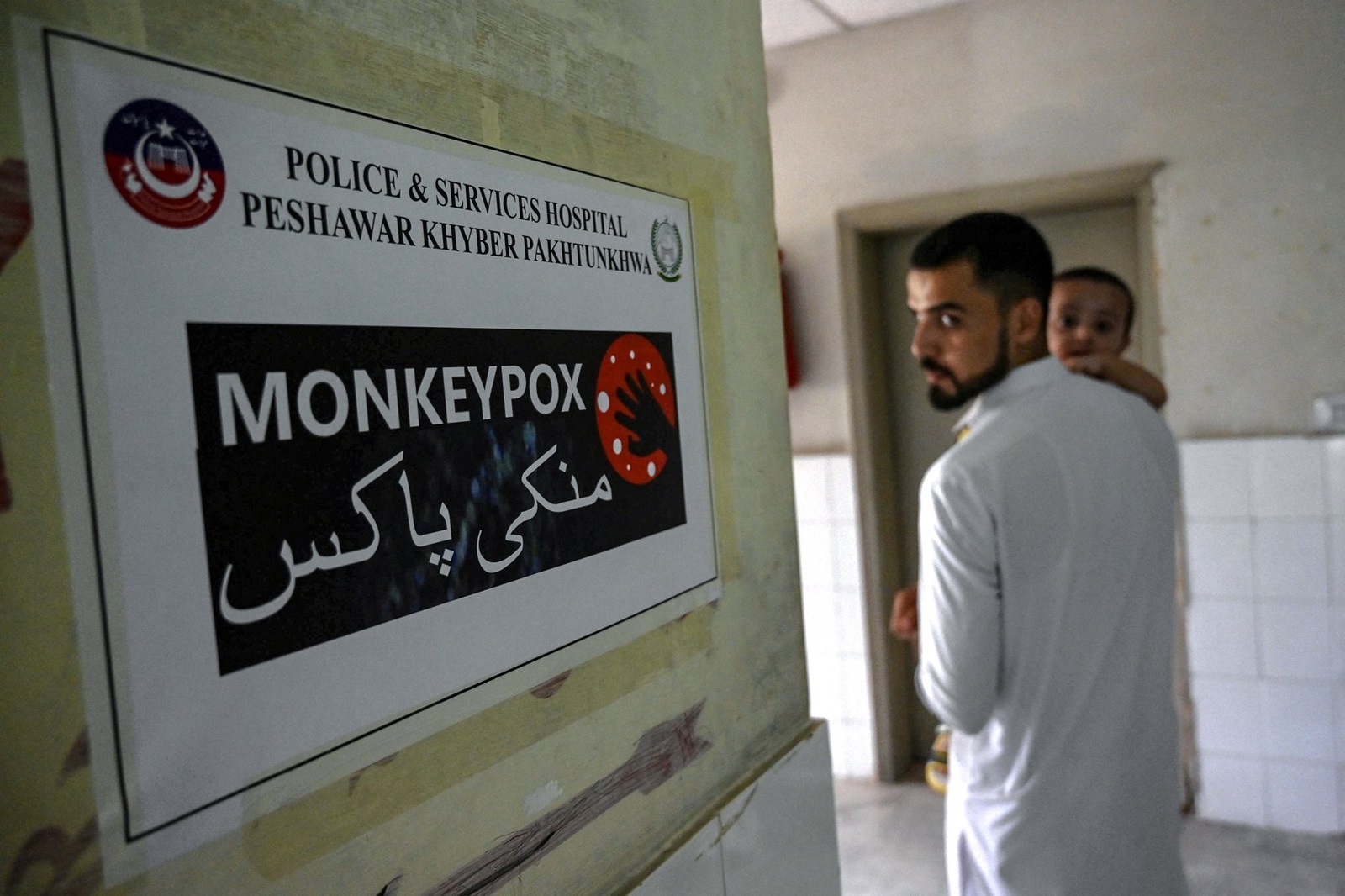 A poster indicating an isolation ward, prepared for mpox patients, is seen at the Police and Services hospital in Peshawar on August 20, 2024. A case of mpox in Pakistan announced last week was not the new strain spreading through Africa, health officials said on August 19.,Image: 900061144, License: Rights-managed, Restrictions: , Model Release: no, Credit line: Abdul MAJEED / AFP / Profimedia