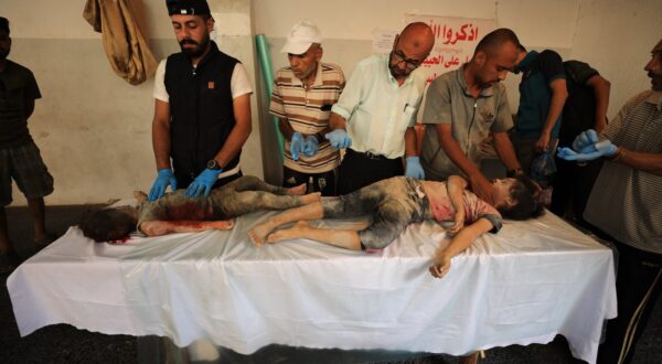 GAZA CITY, GAZA - AUGUST 04: (EDITORS NOTE: Image depicts death) The bodies of Palestinians who lost their lives after Israeli attack on a school where displaced Palestinians took shelter, are brought by their relatives to Al-Ahli Arab Hospital for burial in Gaza City, Gaza on August 04, 2024. Dawoud Abo Alkas / Anadolu/ABACAPRESS.COM,Image: 895905036, License: Rights-managed, Restrictions: , Model Release: no, Credit line: AA/ABACA / Abaca Press / Profimedia