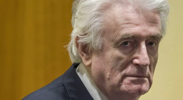 Former Bosnian Serb leader Radovan Karadzic reacts at the court room of the International Residual Mechanism for Criminal Tribunals in The Hague, Netherlands, on March 20, 2019, while waiting to hear the final judgement on his role in the bloody conflict that tore his country apart a quarter of a century ago.
  Karadzic is sentence to life imprisonment by UN judges on March 20, 2019. Radovan Karadzic  was notorious for his role in the 1995 Srebrenica massacre where more than 8,000 Muslim men and boys were slaughtered in the worst bloodletting on European soil since World War II.,Image: 420799481, License: Rights-managed, Restrictions: , Model Release: no, Credit line: Peter Dejong / AFP / Profimedia