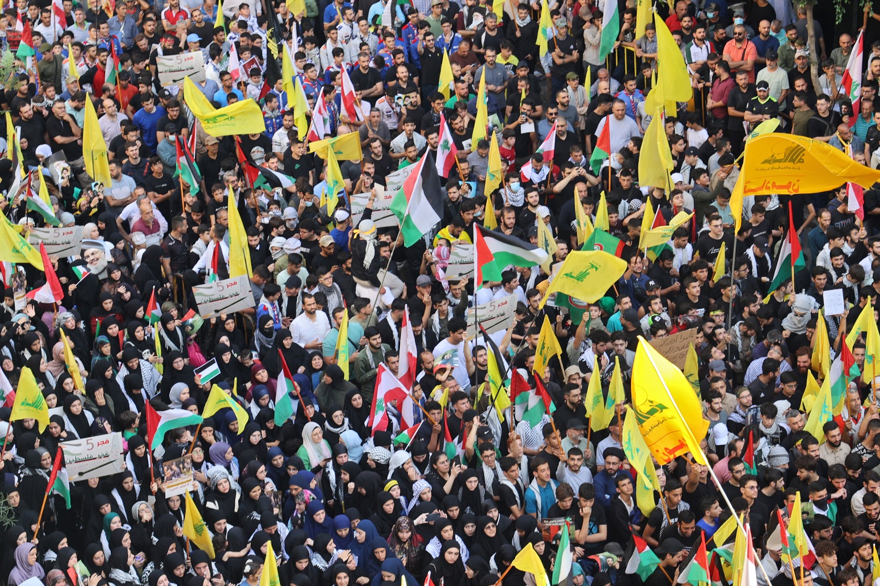 People take part in a demonstration organised by Lebanese Shiite group Hezbollah in the southern suburbs of Beirut on October 18, 2023, following a strike which ripped through a Gaza hospital compound killing hundreds the day before. Thousands rallied across the Arab world on October 18 to protest the deaths of hundreds of people in a strike on a Gaza hospital they blame on Israel, despite its denials.,Image: 814681305, License: Rights-managed, Restrictions: , Model Release: no, Credit line: ANWAR AMRO / AFP / Profimedia