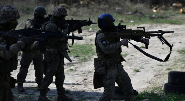 Members of the Siberian battalion within the Ukrainian Armed Forces take part in a military training exercise on a shooting range in Kyiv region on April 10, 2024, amid the Russian invasion of Ukraine. The volunteer Siberian Battalion is a part of the International Legion within the Ukrainian Armed Forces and is made up of Russians who have come to fight against their fellow citizens. They are a varied group - both ethnic Russians and members of minority ethnic groups.,Image: 863843698, License: Rights-managed, Restrictions: , Model Release: no, Credit line: Genya SAVILOV / AFP / Profimedia