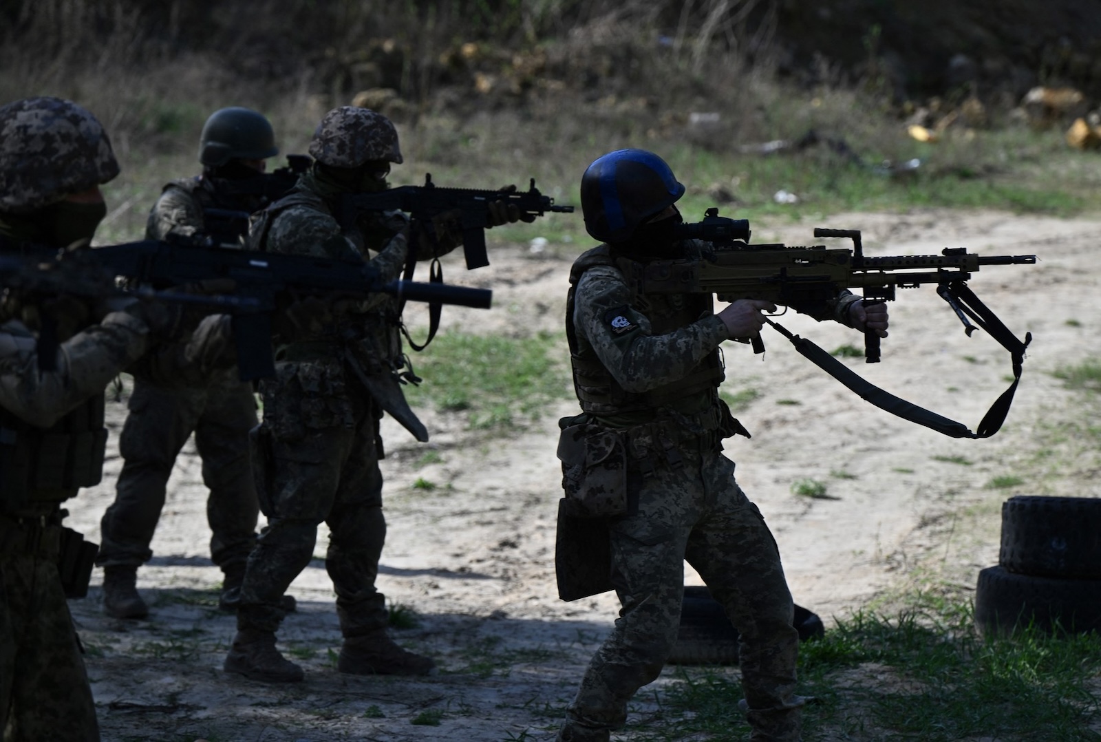 Members of the Siberian battalion within the Ukrainian Armed Forces take part in a military training exercise on a shooting range in Kyiv region on April 10, 2024, amid the Russian invasion of Ukraine. The volunteer Siberian Battalion is a part of the International Legion within the Ukrainian Armed Forces and is made up of Russians who have come to fight against their fellow citizens. They are a varied group - both ethnic Russians and members of minority ethnic groups.,Image: 863843698, License: Rights-managed, Restrictions: , Model Release: no, Credit line: Genya SAVILOV / AFP / Profimedia