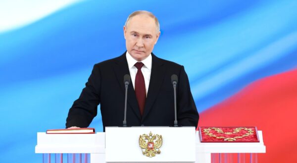 During Putin's initial presidential tenure, the Russian economy grew on average by seven percent per year, driven by economic reforms and a fivefold increase in the price of oil and gas.[9][10] Additionally, Putin led Russia in a conflict against Chechen separatists, reestablishing federal control over the region.While serving as prime minister under Medvedev, he oversaw a military conflict with Georgia and enacted military and police reforms. In his third presidential term, Russia annexed Crimea and supported a war in eastern Ukraine through several military incursions, resulting in international sanctions and a financial crisis in Russia. He also ordered a military intervention in Syria to support his ally Bashar al-Assad during the Syrian civil war, ultimately securing permanent naval bases in the Eastern Mediterranean.

In February 2022, during his fourth presidential term, Putin launched a full-scale invasion of Ukraine, which prompted international condemnation and led to expanded sanctions. In September 2022, he announced a partial mobilization and forcibly annexed four Ukrainian oblasts into Russia. In March 2023, the International Criminal Court issued an arrest warrant for Putin for war crimes[16] related to his alleged criminal responsibility for illegal child abductions during the war.[17] In April 2021, after a referendum, he signed into law constitutional amendments that included one allowing him to run for reelection twice more, potentially extending his presidency to 2036.[18][19] In June 2023, he survived the Wagner Group rebellion. In March 2024, he was reelected for another term.

Under Putin's rule, the Russian political system has been transformed into an authoritarian dictatorship.[20][21][22] His rule has been marked by endemic corruption and widespread human rights violations, including the imprisonment and suppression of political opponents.,Image: 871096814, License: Royalty-free, Restrictions: , Model Release: no, Credit line: American Photo Archive / Alamy / Alamy / Profimedia